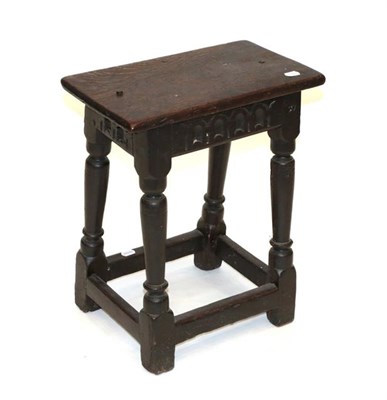 Lot 463 - A Late 17th Century Oak Joint Stool, the four peg top above a nulled frieze and stamped R, on...