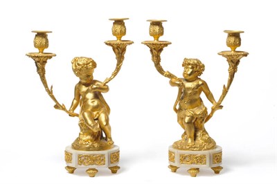 Lot 1289 - After Clodion: A Pair of Gilt Bronze Figural Candelabra, each as a Bacchic cherub sitting on a...