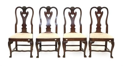 Lot 474 - A Set of Four Early 18th Century Joined Oak High-Back Dining Chairs, the shell carved top rails...