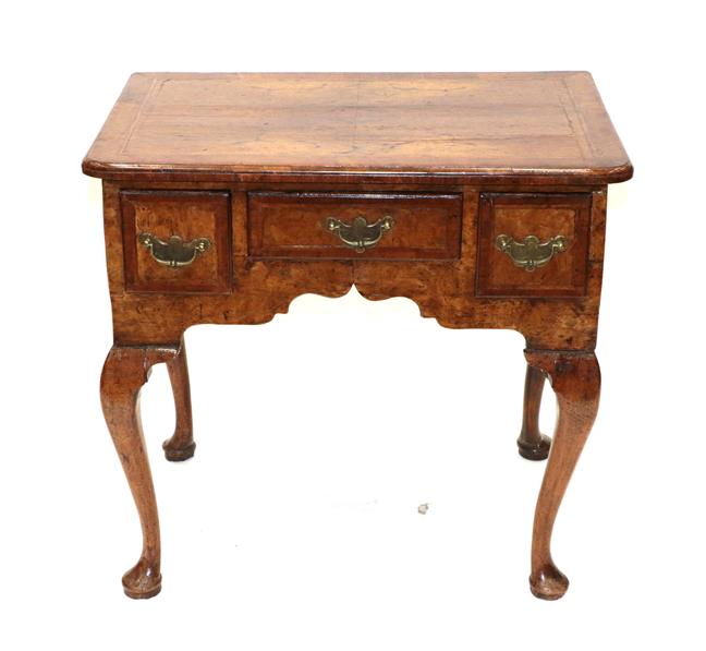 Lot 483 - A George III Oak and Crossbanded Kneehole Dressing Table, late 18th century, the reeded edge...