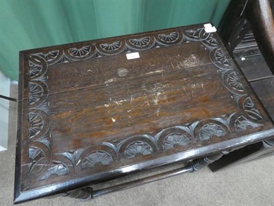 Lot 497 - A Victorian Carved Oak Hall Table, late 19th century, the rectangular top with lunette carved...