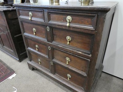 Lot 502 - A Late 17th Century Joined Oak Chest, the moulded top above two short drawers with three two-as-one