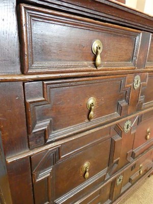 Lot 503 - A Late 17th Century Oak Geometric Moulded Straight Front Chest, the moulded top above three...