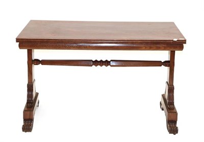 Lot 534 - A Mahogany Pillar-End Writing Table, the base 19th century, the top later, of rectangular form with