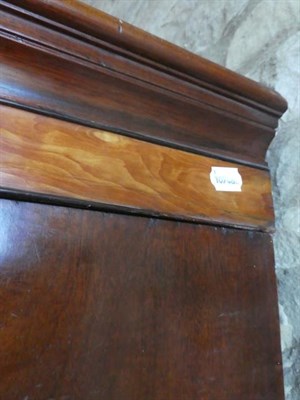 Lot 541 - A George III Mahogany and Satinwood Banded Press Cupboard, late 18th century, the cavetto...