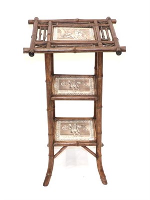 Lot 549 - A Late Victorian Bamboo Three-Tier Occasional Table, each tier with three Victorian tiles depicting