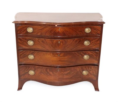 Lot 558 - A George III Mahogany Serpentine Fronted Chest, circa 1800, the moulded top above four long...