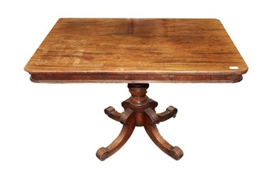 Lot 564 - A Mahogany Flip-Top Pedestal Table, 2nd quarter 19th century, of rounded rectangular form with...