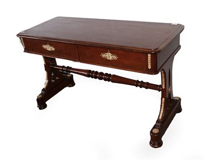Lot 565 - A Late 19th Century Mahogany and Gilt Metal Mounted Writing Table, in Empire style, the moulded top