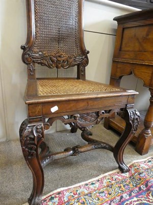 Lot 566 - A Pair of William & Mary Style Carved Walnut Side Chairs, in the style of Daniel Marot, with...