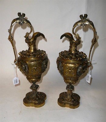 Lot 1303 - A Pair of Gilt Bronze Renaissance Style Ewers, 19th century, of baluster form with arched...