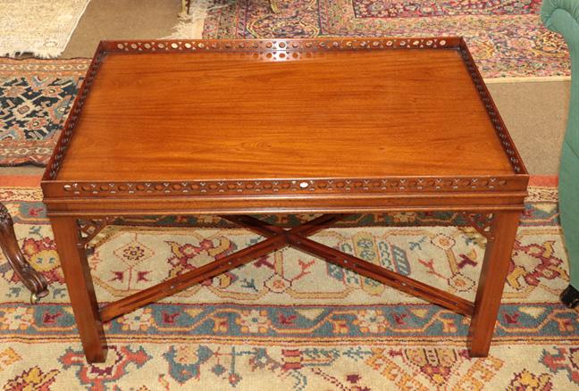 Lot 617 - A Reproduction Mahogany Rectangular Coffee Table, in Chippendale style, with pierced fretwork...