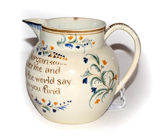 Lot 4 - An early 19th century English pearlware documentary jug, painted in underglaze coloured enamels and