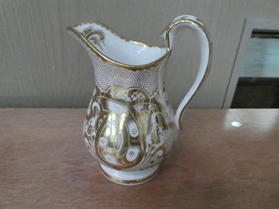 Lot 13 - A 19th century English porcelain tea set with lavish gilt decoration, impressed M H & Co (one tray)