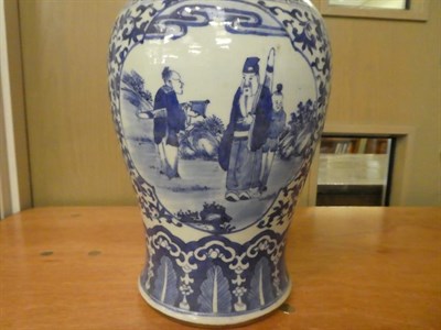 Lot 23 - A 19th century Chinese blue and white vase and cover, painted in underglaze blue with panels of...