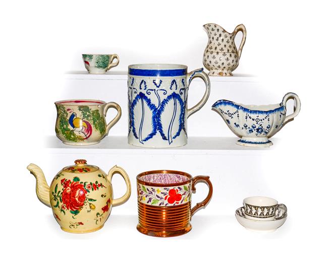 Lot 30 - A tray of 18th century and later English pottery, including a pearlware tankard and sauce boat,...
