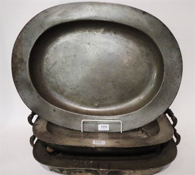 Lot 1315 - A Pair of Early 19th Century Pewter Two-Handled Meat Warming Dishes, of oblong form, with...