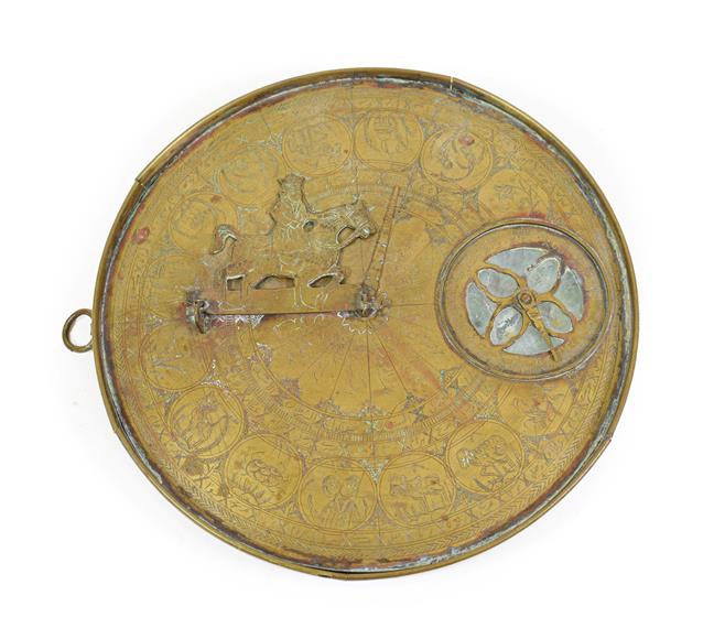 Lot 3076 - Persian Brass Sundial/Compass 9 1/4'' diameter with astrological symbols and other decorations...