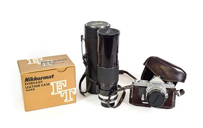 Lot 3122 - Nikkormat FT Camera no.3117903 with Nikkor-H Auto f2 50mm lens in manufacturers leather case...