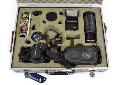 Lot 3126 - Olympus OM1 Outfit consisting of camera no.1887739; lenses: Zuiko f1.8 50mm and Bell & Howell...