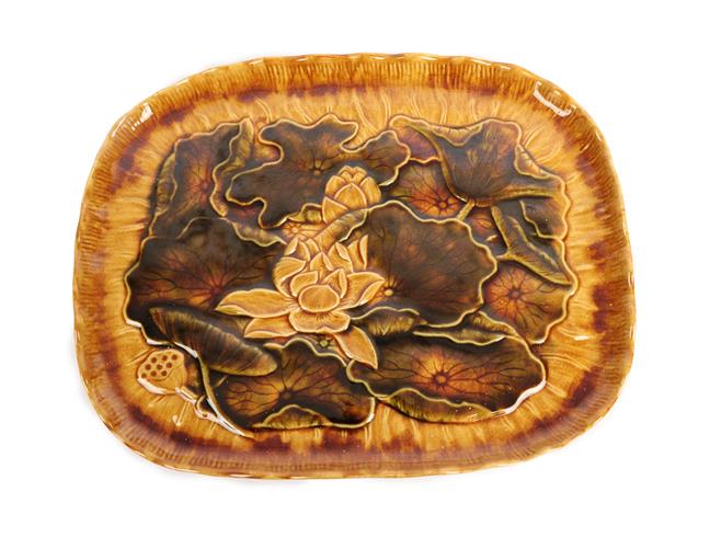 Lot 1008 - Christopher Dresser (Scottish, 1834-1904) for Linthorpe Pottery: A Tray, decorated with water...