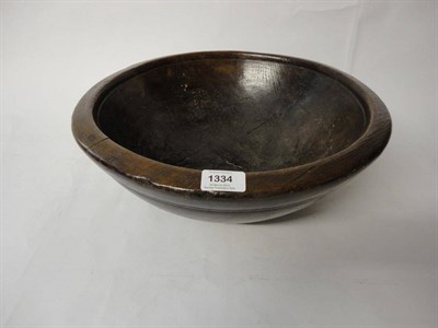 Lot 1334 - A Turned Sycamore Dough Bowl, 19th century, with reeded rim, 41cm diameter