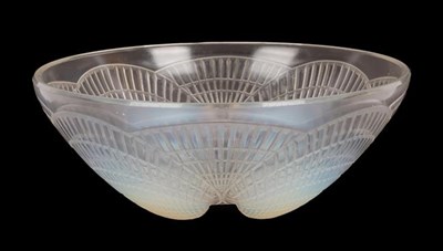 Lot 1025 - René Lalique (French, 1860-1945): A Coquilles Clear and Opalescent Glass Bowl, wheel cut mark...