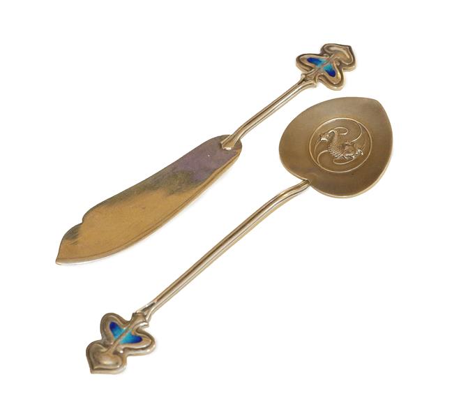 Lot 1032 - An Art & Crafts Silver and Enamel Preserve Spoon and Butter Knife, by G.W.Harvey & Co., both...