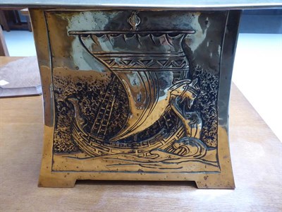 Lot 1036 - A Scottish Arts & Crafts Brass Planter, of square tapering form with projecting rim, repoussé...