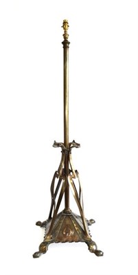Lot 1044 - An Art Nouveau Lacquered Copper Telescopic Standard Lamp, c.1910, on four supports, weighted...