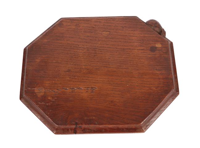 Lot 1051 - Robert Mouseman Thompson (1876-1955): An English Oak Bread Board, of canted rectangular shape, with