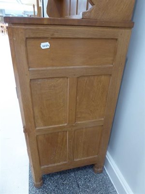 Lot 1055 - Workshop of Robert Mouseman Thompson (Kilburn): An English Oak Panelled 5ft Welsh Dresser, the open