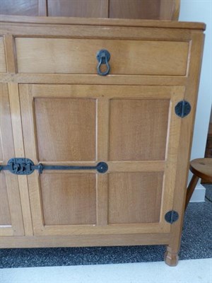 Lot 1060 - Workshop of Robert Mouseman Thompson (Kilburn): An English Oak Panelled 4ft Welsh Dresser, the...