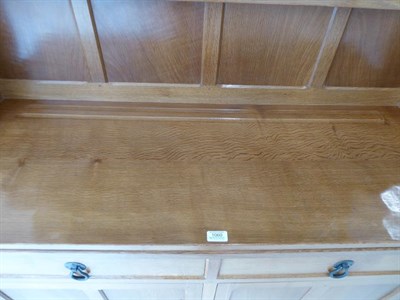 Lot 1060 - Workshop of Robert Mouseman Thompson (Kilburn): An English Oak Panelled 4ft Welsh Dresser, the...