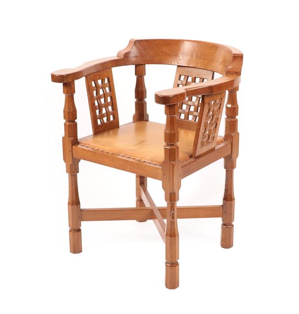 Lot 1063 - Workshop of Robert Mouseman Thompson (Kilburn): An English Oak Monk's Chair, with curved back...