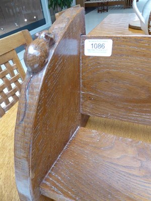 Lot 1086 - Workshop of Robert Mouseman Thompson (Kilburn): An English Oak Book Trough, with carved mouse...