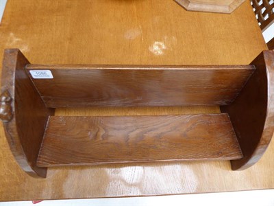 Lot 1086 - Workshop of Robert Mouseman Thompson (Kilburn): An English Oak Book Trough, with carved mouse...