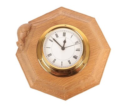 Lot 1110 - Workshop of Robert Mouseman Thompson (Kilburn): An English Oak Wall Clock, the octagonal frame with