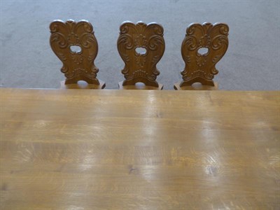 Lot 1184 - An Arts & Crafts Bavarian Carved Oak Dining Room Suite, made by Klaus Trommer (Tuntenhausen), April
