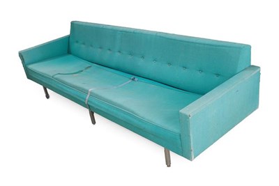 Lot 1186 - A 1960's Button Back Sofa, probably designed by Robin Day, turquoise fabric, on a frame base...