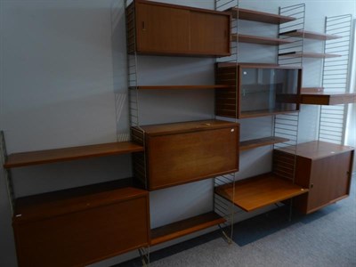 Lot 1189 - A 1960's Bokhyllan ''The Ladder Shelf'' Shelving System, designed by Nisse Strinning for...
