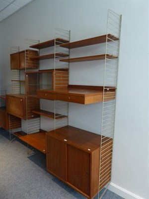 Lot 1189 - A 1960's Bokhyllan ''The Ladder Shelf'' Shelving System, designed by Nisse Strinning for...