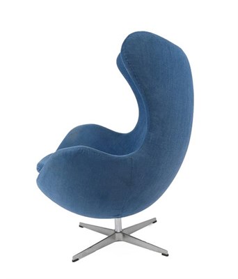 Lot 1190 - An Egg Lounge Chair, blue weave upholstery, on a cast aluminium swivel base stamped white:,...