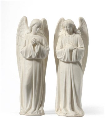 Lot 1364 - A Pair of Italian White Marble Figures of Angels, 20th century, each with flowing hair and...