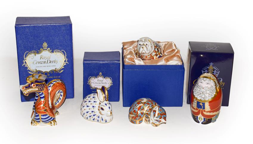 Lot 37 - A Royal Crown Derby Imari paperweights, Sleeping Cat, Bull dog, Duck, Santa Claus and a Rabbit, all