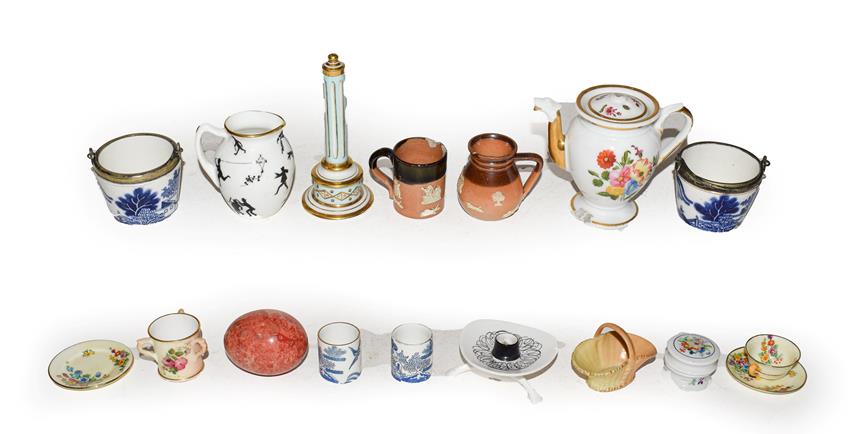 Lot 40 - A quantity of pottery and porcelain miniatures including a Royal Worcester tyg, Paris coffee...