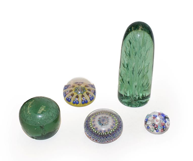 Lot 54 - A Stourbridge dump paperweight together with another similar and three polychrome paperweights (one