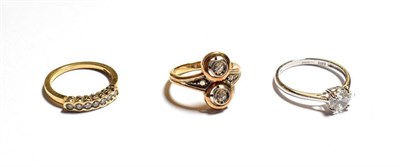Lot 66 - A diamond two stone ring, stamped '585', finger size K1/2, a 14 carat gold cubic zirconia solitaire