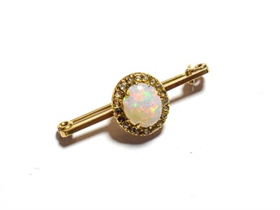 Lot 71 - A 9 carat gold opal and diamond cluster bar brooch, length 3.8cm