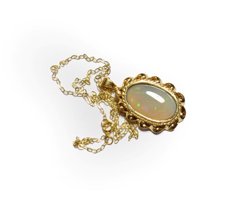 Lot 80 - A 9 carat gold opal pendant on chain, pendant length 3.0cm, chain length 41cm